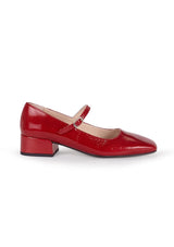 Red mary jane pumps in a classic patent leather with an adjustable strap and a square toe.