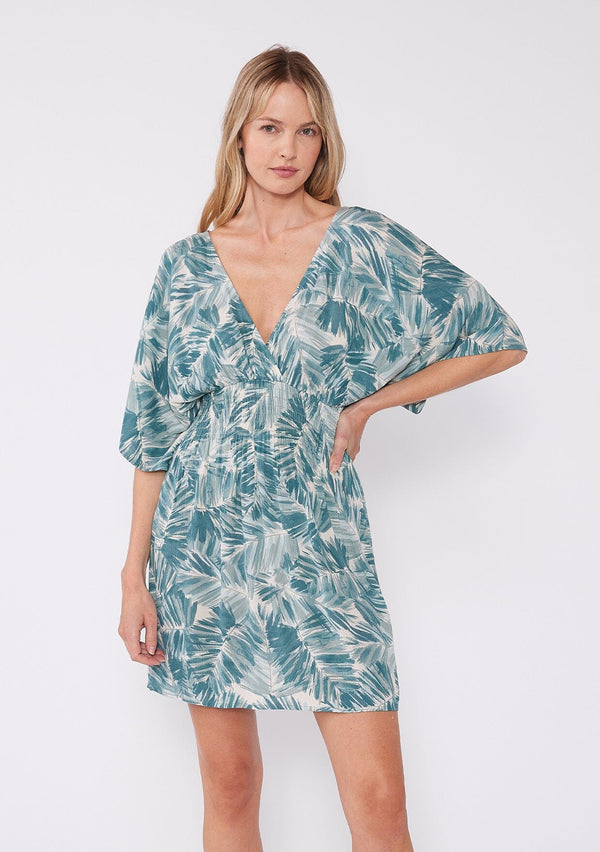 [Color: Green] Relaxed fit bohemian mini dress with half length sleeves, deep v neckline, and a green and white abstract palm leaf print. The perfect lightweight billowy summer mini dress.
