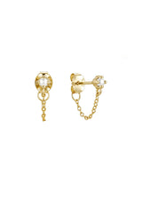 A delicate chain stud earring with a freshwater pearl accent. Made with fourteen karat gold plating on sterling silver. Hypoallergenic and made in the USA.