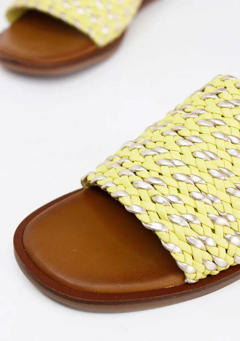 [Color: Citron/Gold] A yellow and gold leather woven slide sandal. Sustainably hand made in small batches. 