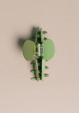 [Color: Pear] A two tone green medium sized hair clip by Nat and Noor. 