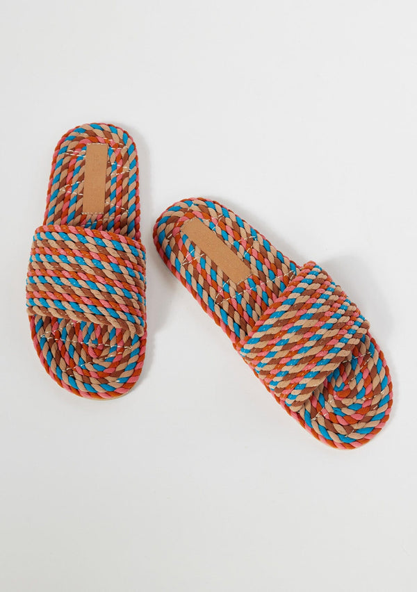 [Color: Retro] A colorful pink hand dyed rope slide sandal. Sustainably made in small batches.