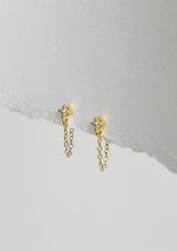 A delicate chain stud earring with a freshwater pearl accent. Made with fourteen karat gold plating on sterling silver. Hypoallergenic and made in the USA.