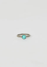 [Color: Turquoise] A sterling silver ring from Moon Pi jewelry with a turquoise stone.