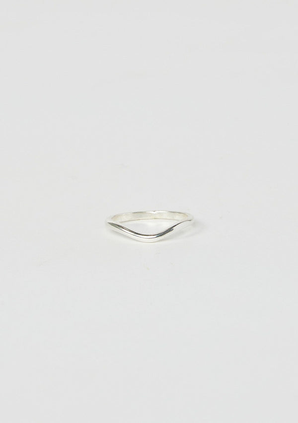 [Color: Silver Arched] An arched stacking ring hand made from sterling silver.