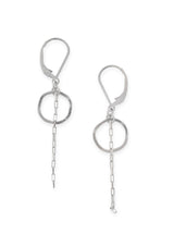 Pair of silver earrings with a small hammered circle and chain drop detail. Attached to a round wire lever back.