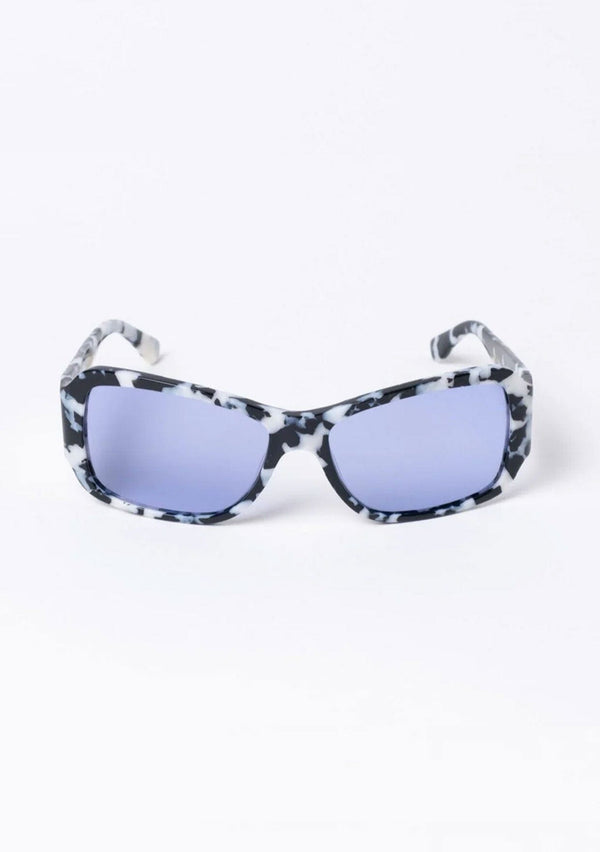 [Color: Blue] An oversized pair of sunglasses with a rectangular frame, made with biodegradable acetate and polarized blue lenses.