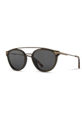 Sunglasses with dark lenses and wood frame on a white background
