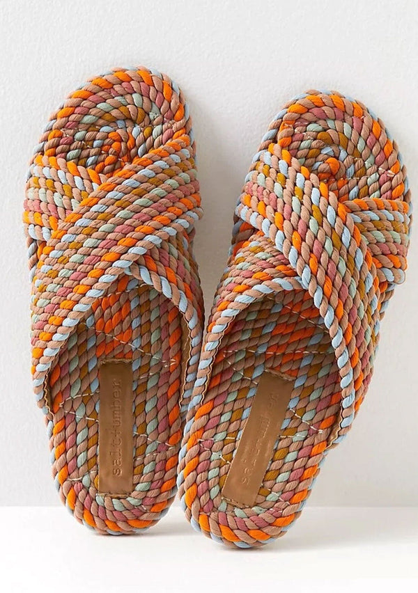 [Color: Sun-Bleached Pastel] A colorful hand dyed woven rope slide sandal with crossover top straps. Sustainably made in small batches. 
