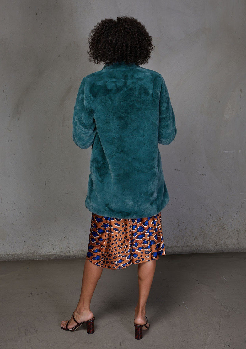 [Color: Vintage Pine] An ultra luxe faux fur statement coat in bright bold color. Featuring essential side pockets, a silky lining, and a soft hand feel. Styled here with a leopard print slip dress.