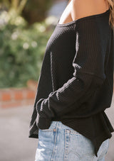 [Color: Black] Black waffle knit cozy long sleeve pullover top.