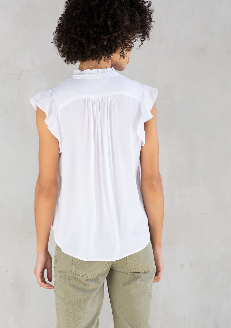 [Color: Chalk] A classic white bohemian top, designed in silky crepe. With short flutter cap sleeves and a self covered button front.