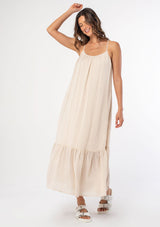 [Color: Vanilla] An ultra flowy off white bohemian sleeveless maxi dress with a strappy tie back and side pockets. 