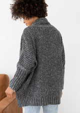 [Color: Charcoal] An open knit marled cardigan. Featuring a flattering cocoon fit, a relaxed shawl collar, and essential side pockets.