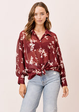 [Color: Brick/Rosewater] A versatile floral chiffon top, featuring long dolman sleeves and a billowy silhouette. Shown here with a camisole underneath.