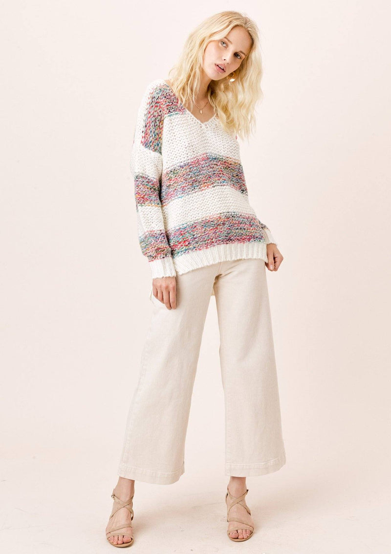 [Color: OffWhite/Multi] Lighten up your day and stay cozy in this beautiful loose knit white sweater with multi color rainbow yarn stripes, featuring a cute v neckline and ribbed hem. It is a spring and summer closet staple for breezy days.