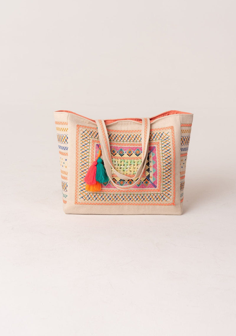 [Color: Natural/Neon Coral] A bohemian large tote bag with center lattice detail, embroidery, extra large tassel accent, and two straps. With a magnetic closure. 