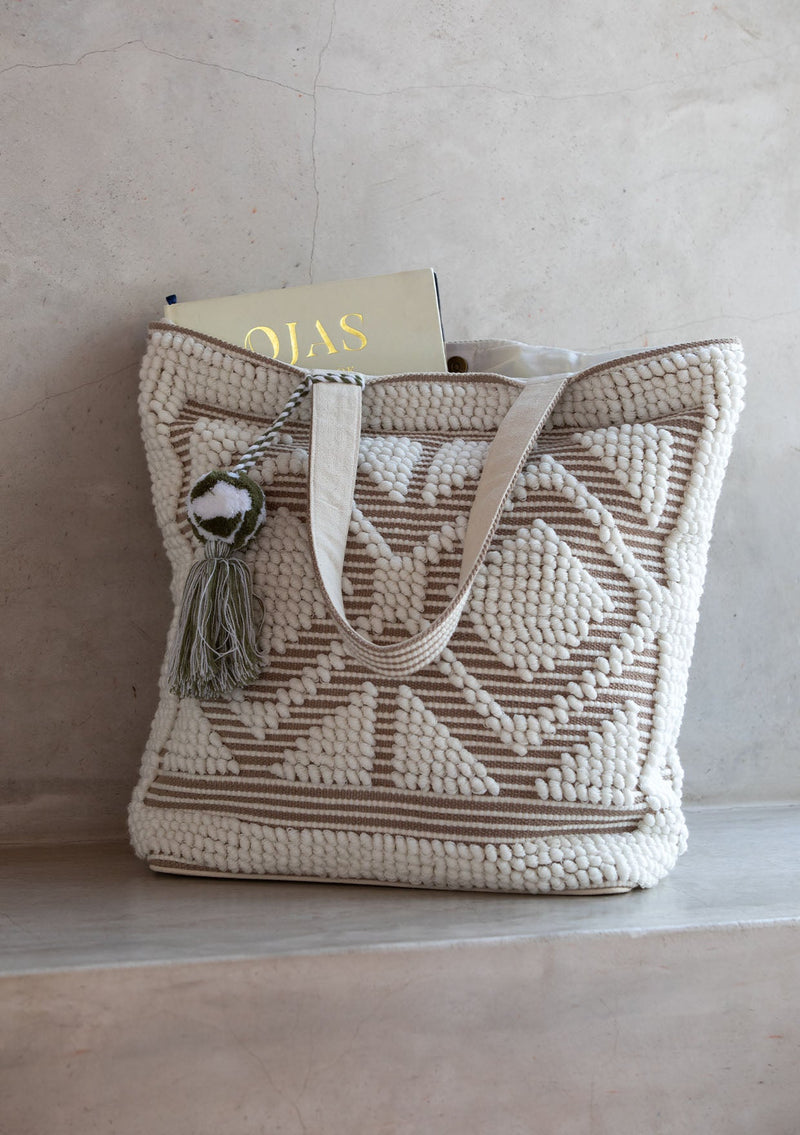 [Color: White/Taupe] An oversize white and taupe bohemian carpet tote bag.