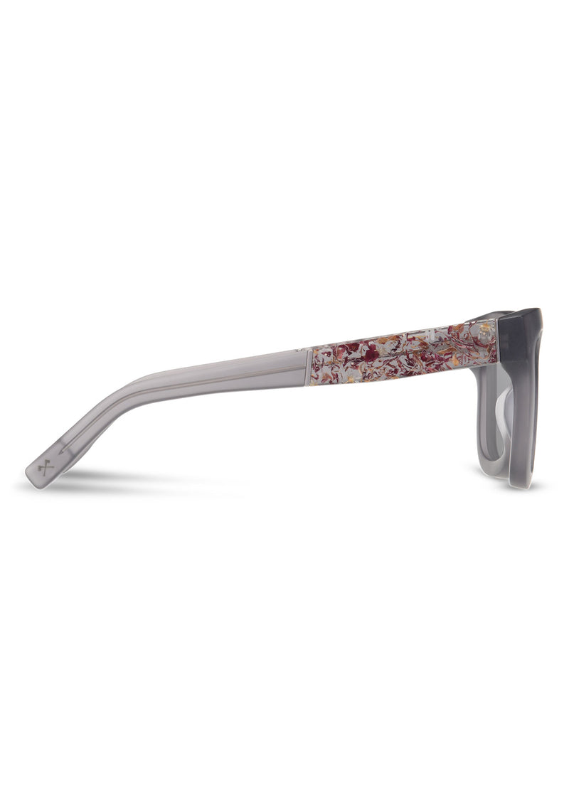 [Color: Matte Smoke] Sunglasses with a warm brown lens and a rose flower inlay.