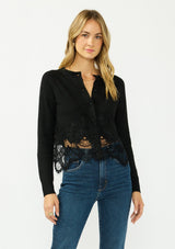 [Color: Black] A front facing image of a blonde model wearing a black lace cardigan with a button front. 