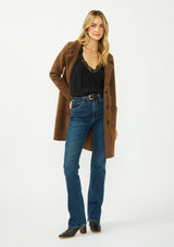 [Color: Brown/Black] A front facing image of a blonde model wearing a brown plaid sweater coat with a notched collar, button front, and front patch pockets. Styled with a black lace trim cami and dark wash denim. 