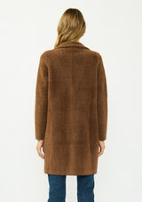 [Color: Brown/Black] A back facing image of a blonde model wearing a brown plaid sweater coat with a notched collar, button front, and front patch pockets. 