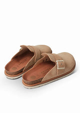 [Color: Almond] Tan velour clogs with cork and foam sole and gold buckle strap.
