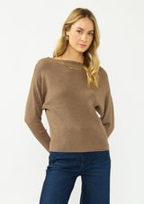 [Color: Mocha] A front facing image of a blonde model wearing an brown pullover sweater with a boat neckline and long sleeves that taper at the cuffs. 