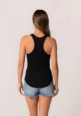 [Color: Black] A half body side facing image of a brunette model wearing a classic slim fit stretchy knit black tank top with a scoop neckline and racerback.