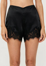 [Color: Black] A front facing image of black satin lace short. 