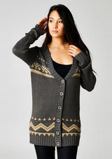 [Color: Grey/Taupe] A front facing image of a brunette model wearing a black and beige button front cardigan with a southwestern design, long sleeves, deep v-neckline, and ribbed trim. 