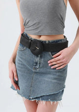 [Color: Black] A model wearing a wide black woven belt with a large round decorative buckle, styled over a blue denim mini skirt and a gray crop top against a light gray background.