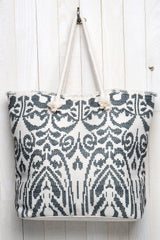 [Color: Black/Vanilla] An image of an summer tote bag crafted in a durable woven design with an abstract pattern. Featuring double rope handles for easy carrying. 