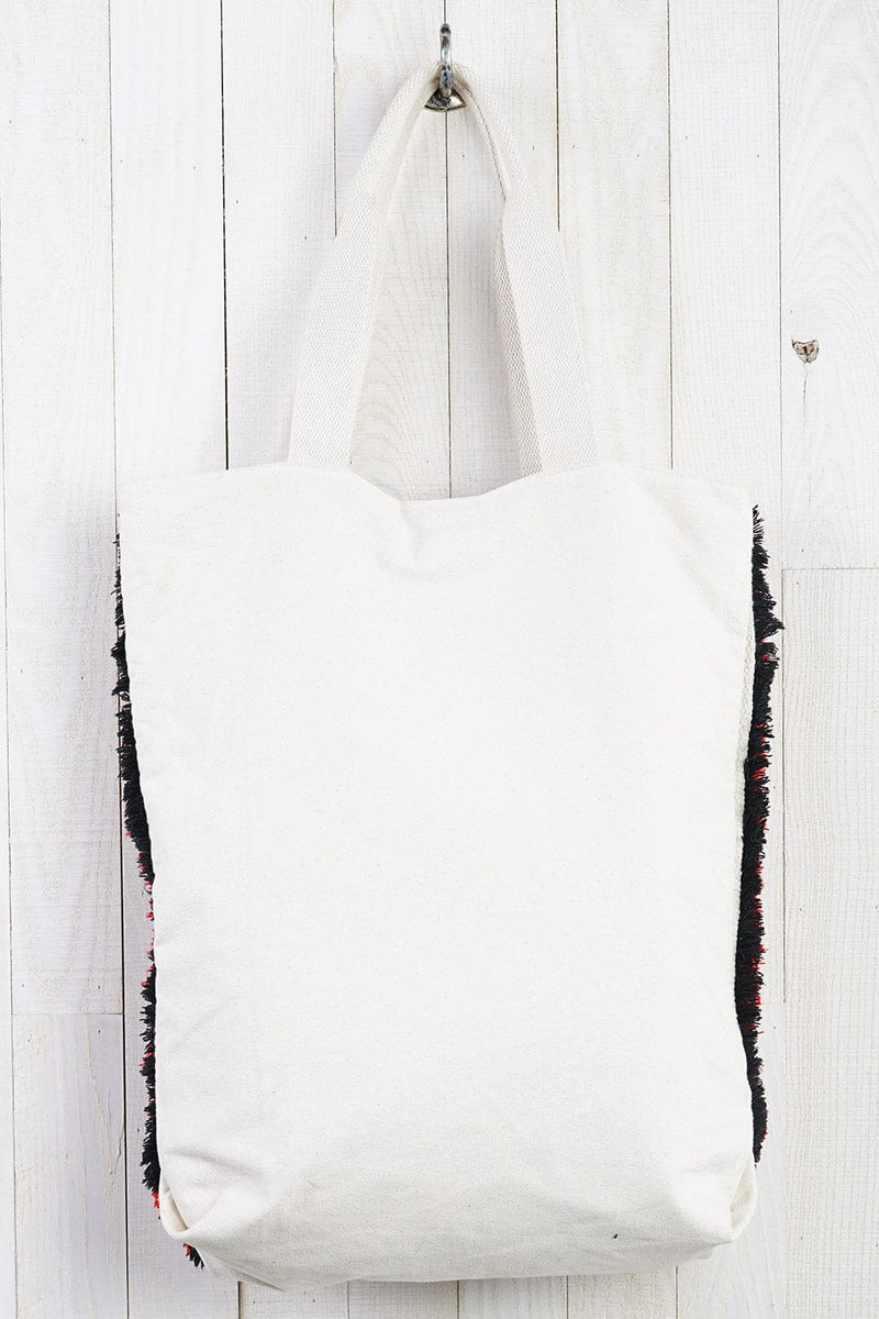 [Color: Blue/Red] A bohemian multicolor fuzzy tote bag with a canvas back.