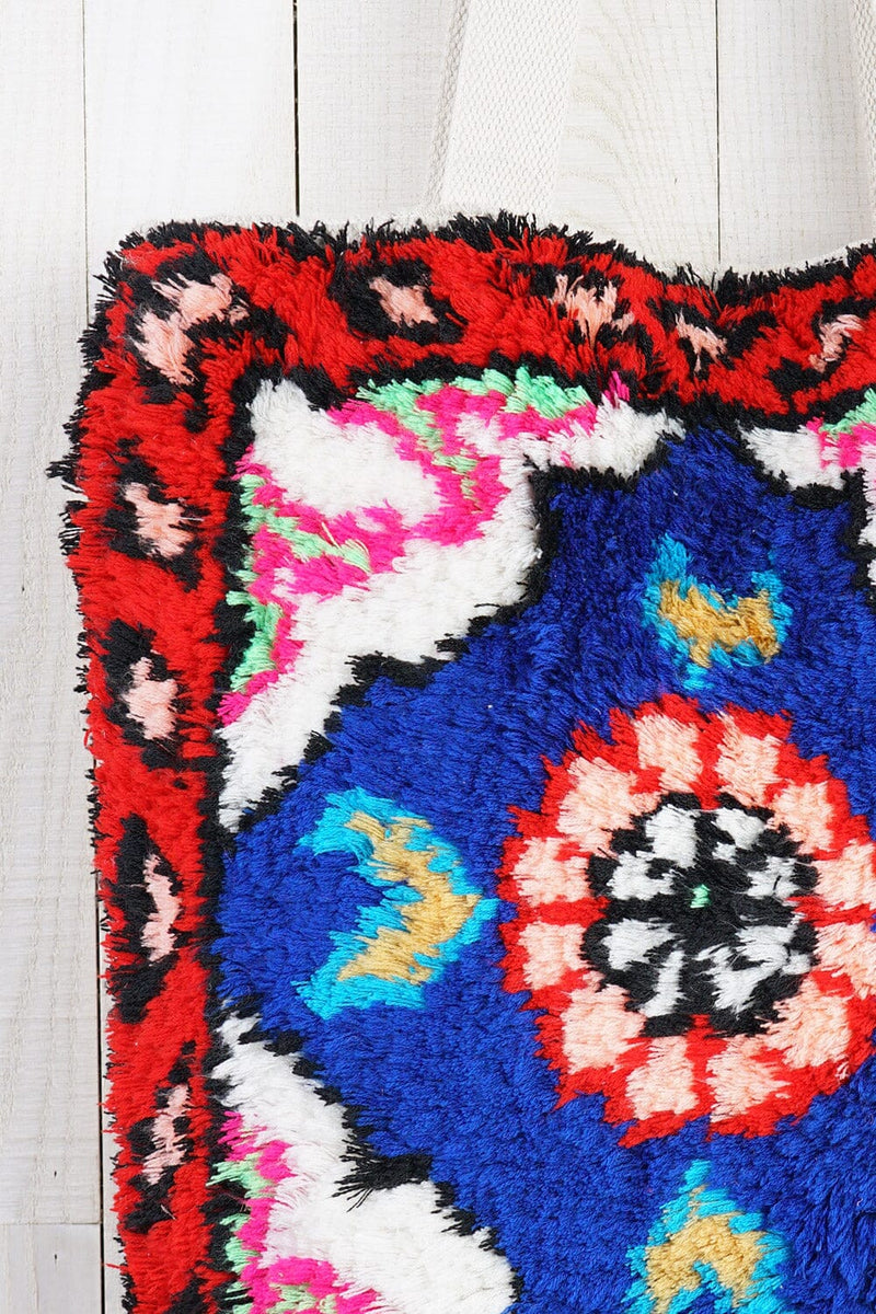 [Color: Blue/Red] A bohemian multicolor fuzzy tote bag with a canvas back.