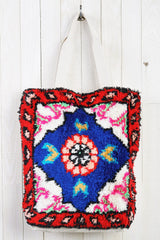 [Color: Blue/Red] A bohemian multicolor fuzzy tote bag with a canvas back.