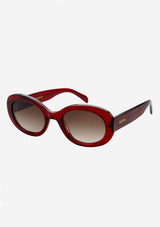 [Color: Dark Cherry] An image of round sunglasses with a red frame from FREYRS.