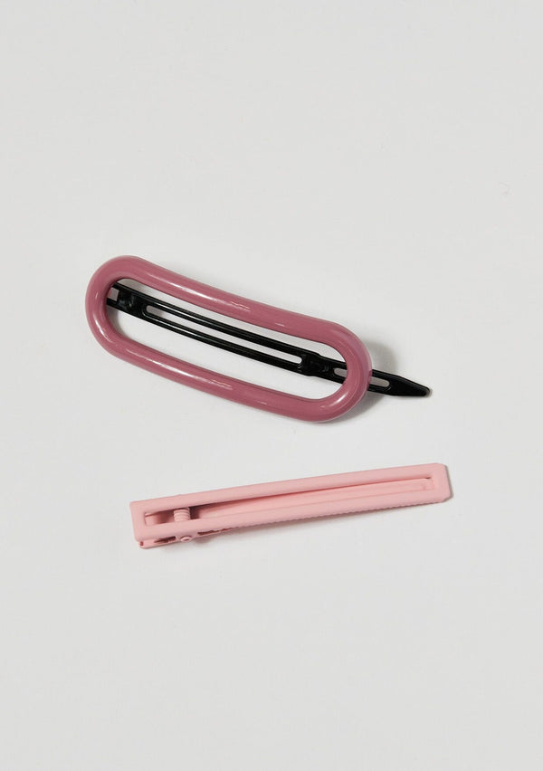 [Color: Pink] A set of 2 hair clips in pink.