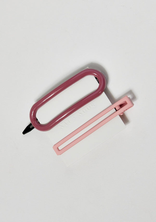 [Color: Pink] A set of 2 hair clips in pink.