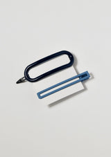[Color: Navy] A set of 2 hair clips in blue.