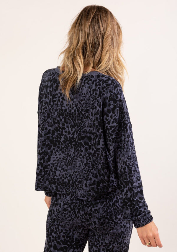 [Color: Ink Combo] A soft pullover sweatshirt in a blue animal print. 