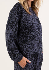 [Color: Ink Combo] A soft pullover sweatshirt in a blue animal print. 