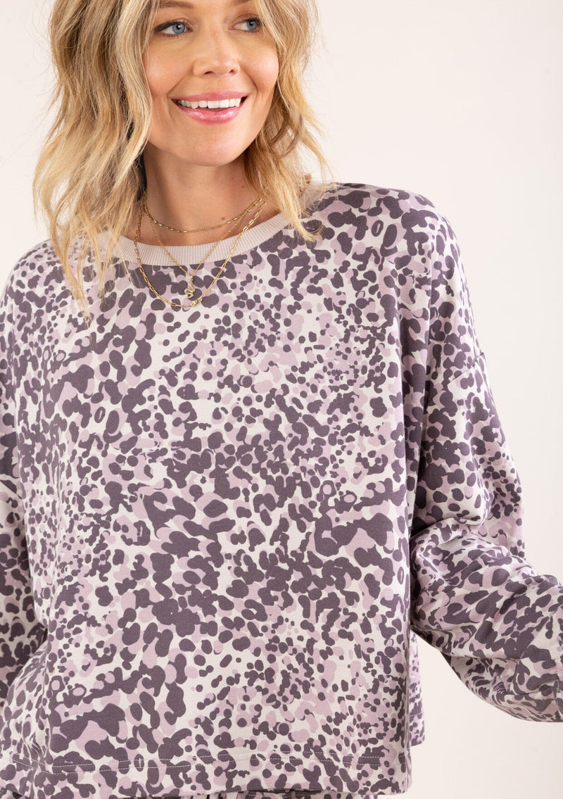 [Color: Lilac Combo] A soft pullover sweatshirt in a purple animal print. 