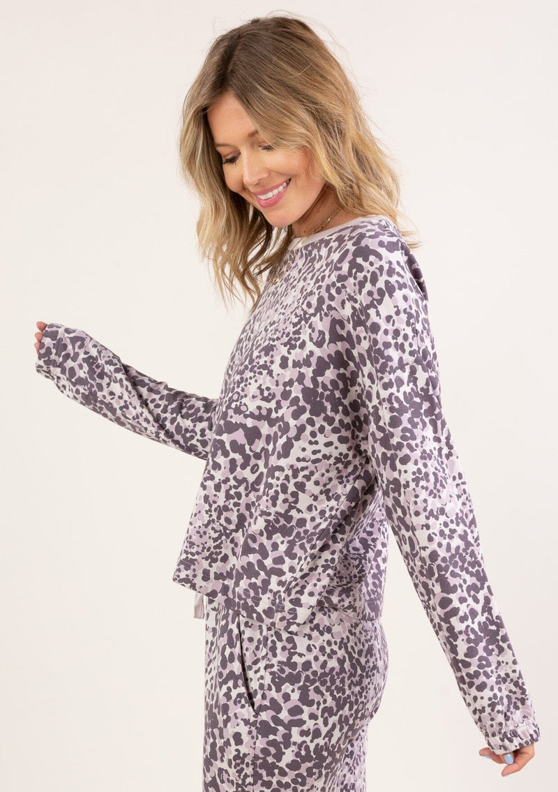 [Color: Lilac Combo] A soft pullover sweatshirt in a purple animal print. 