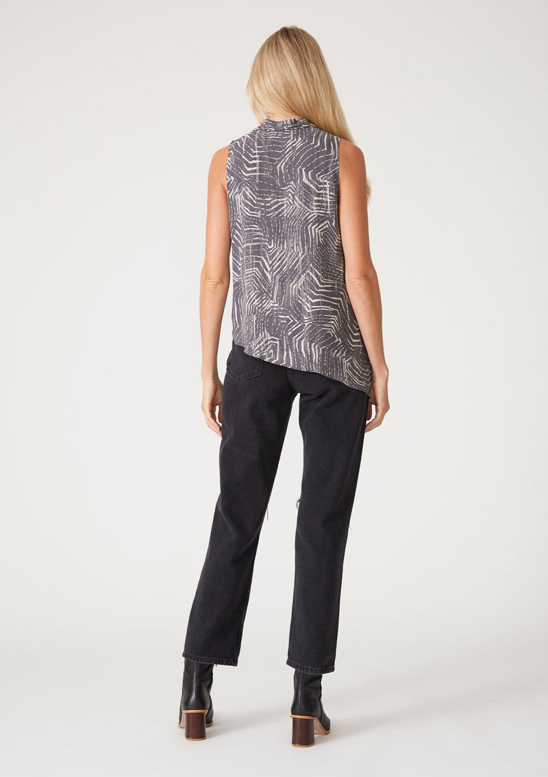 [Color: Grey/Cream] A back facing image of a blonde model wearing a grey printed tank top. With an asymmetric hemline, an exposed side zip closure, a surplice front, and an attached lining with a scoop neckline. 