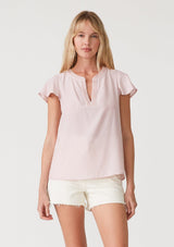 [Color: Dusty Pink] A front facing image of a blonde model wearing a lightweight bohemian resort top  in dusty pink. With short flutter sleeves, a split v neckline with embroidered top stitch details, and a relaxed fit. 