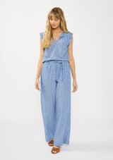 [Color: Blue] A front facing image of a blonde model wearing a blue striped top with a split v neckline, ties, and cap sleeves. Styled with a matching bottom. 