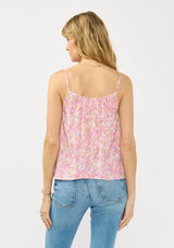 [Color: Natural/Dusty Rose] A back facing image of a blonde model wearing a pink floral print camisole with a smocked neckline, button front, and adjustable spaghetti straps. 