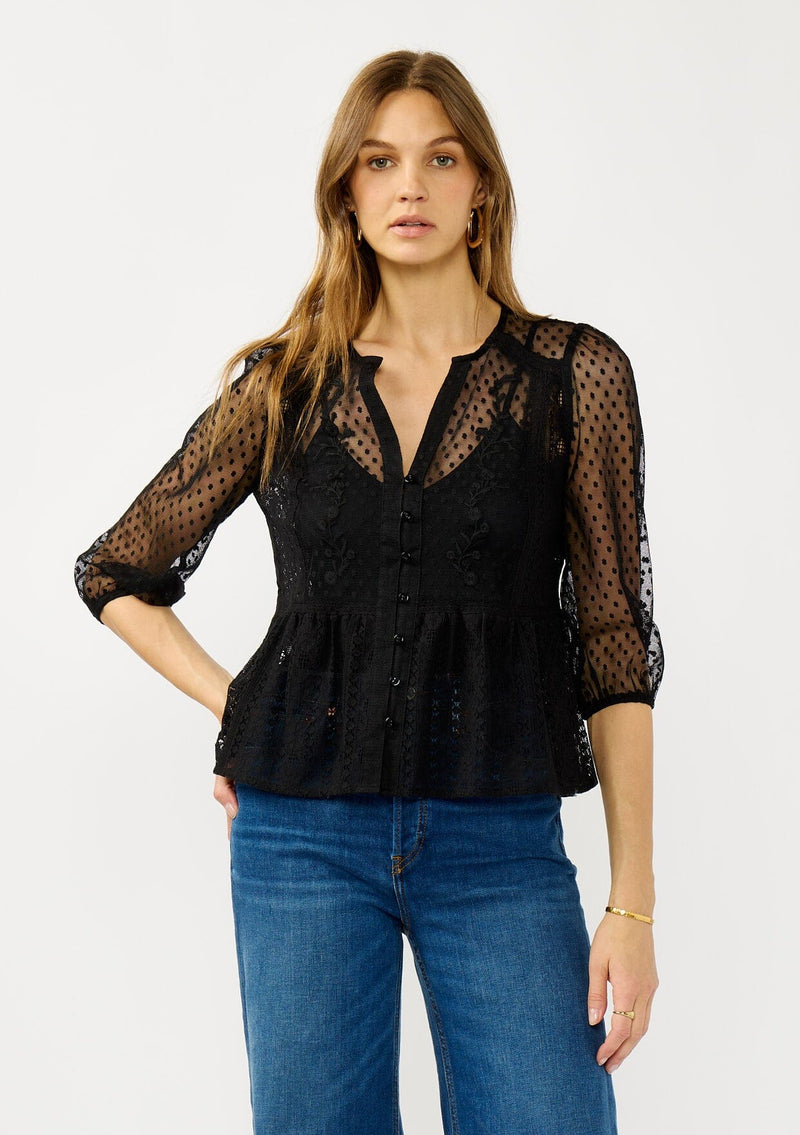 [Color: Black] A front facing image of a blonde model wearing a Victorian mixed lace top with 3/4 length sleeves, a split v-neckline, button front, and a subtle peplum-style silhouette. A versatile black fall lace top. 