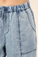 [Color: Acid Indigo] Lovestitch acid indigo wash jogger pant with seamed detail and elastic drawstring waist.